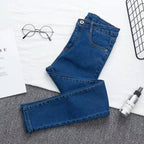Rett jeans med høyt liv og slitte detaljer for dame – full lengde eller 7/8