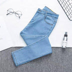 Rett jeans med høyt liv og slitte detaljer for dame – full lengde eller 7/8
