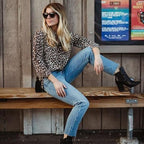 Bluse med leopardmønster for dame – trendy og feminin topp