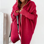 Lang oversized strikkejakke med hette for dame – myk cardigan med flaggermusermer