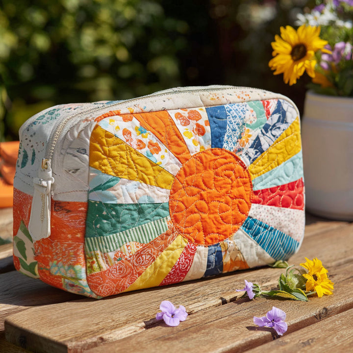 Sminkepung - Sol i patchwork med oransje