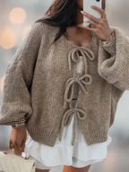 Strikkejakke med sløyfelukning for dame – løs cardigan i boho-stil