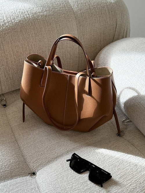 Shopper i skinnlook for dame – tidløs veske i brun, svart, krem og taupe
